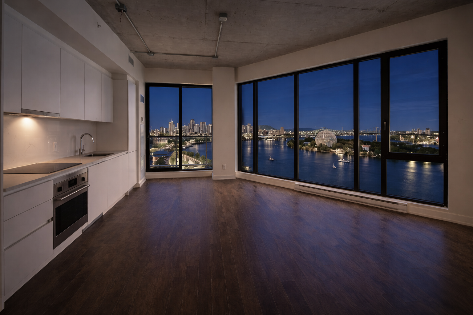 Coin cuisine de condo après retouche pré-livraison avec plancher nettoyé et grandes fenêtres dégagées